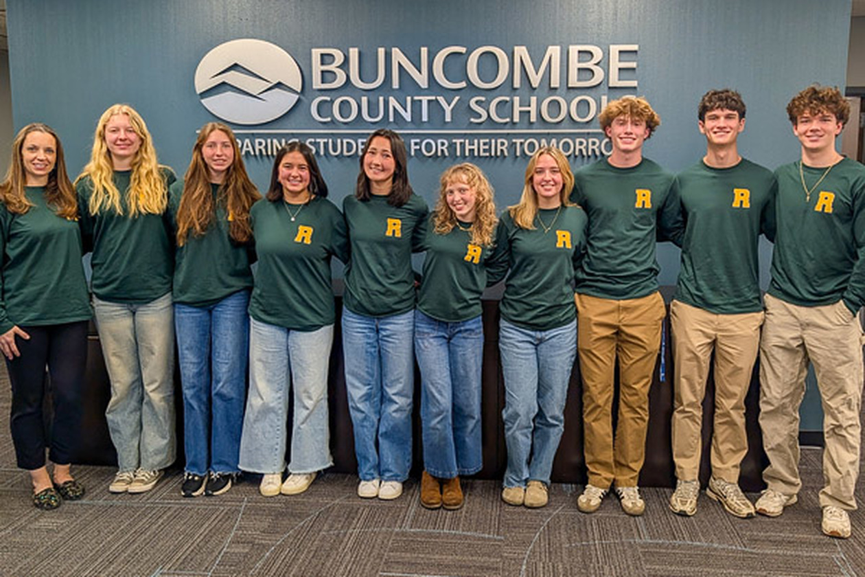 Members of the A.C. Reynolds High School Environmental Club pose at the Central Services building.