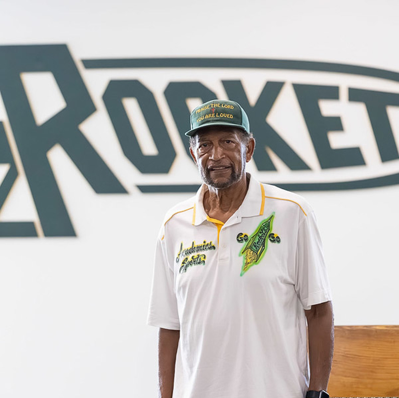 Edgar Waters poses in the A.C. Reynolds High lobby.