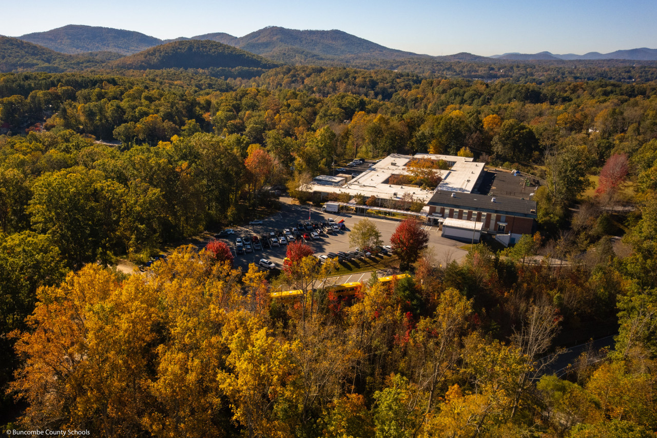 An aerial photo of Charles C. Bell Elementary School surrounded by fall leaves.
