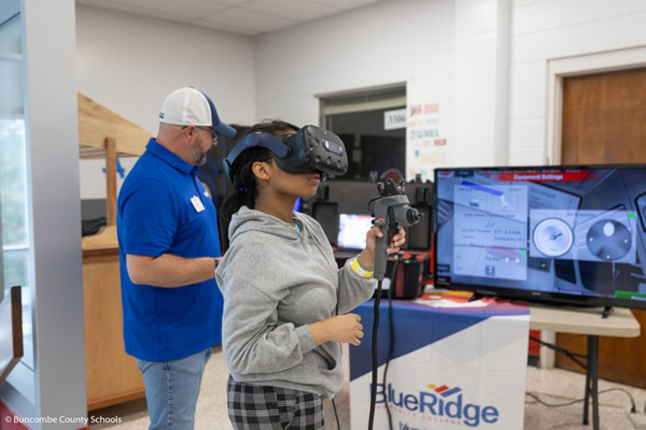 A student operates a VR system during the event.