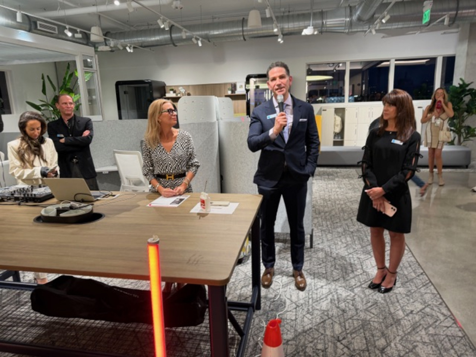 Joel Feldburg, --center CEO of Global to right facing - Elizabeth Guillory (dark hair)-Senior VP of Sale and left facing - is Kristin Adam RSM for the Miami region