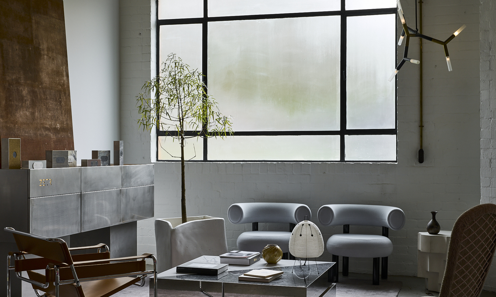 Australian electrical brand ZETR transforms a 1960s garage into a hybrid space that acts as an HQ, showroom, design workshop and production facility