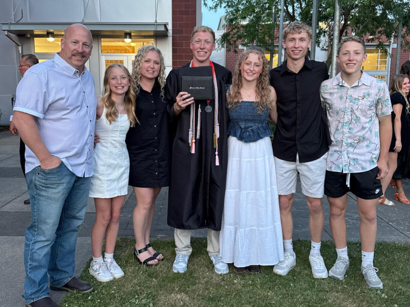Molly Mulick, husband, and family.