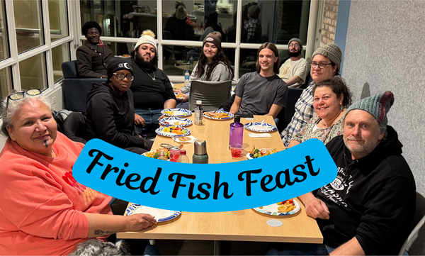 Indigenous Elders in Residence Vera (front left) and Paul (front right) Dressen provided for a fried fish feast for students, faculty, and staff gathered at the Multicultural Center.