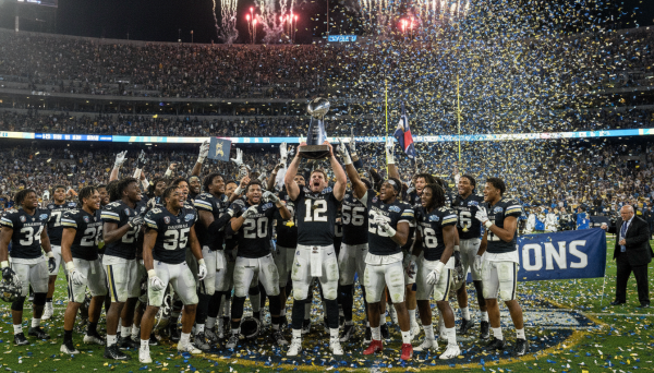 American football team lifting...