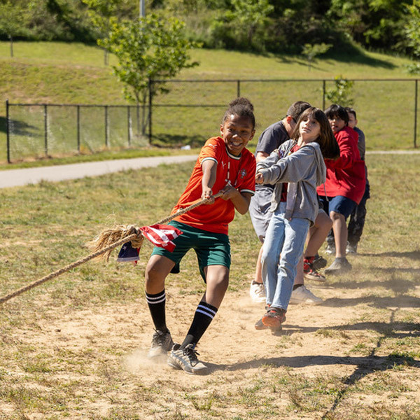 West Buncombe Elementary students play tug-of-war.